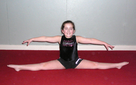 Empire student demonstrates a straddle split